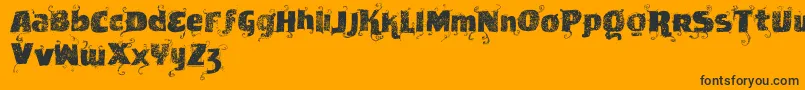 Vtksnewslabel-Schriftart – Schwarze Schriften auf orangefarbenem Hintergrund