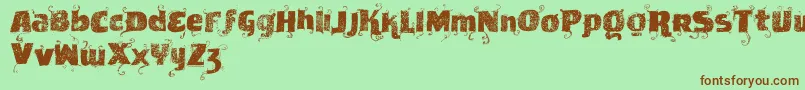 Шрифт Vtksnewslabel – коричневые шрифты на зелёном фоне