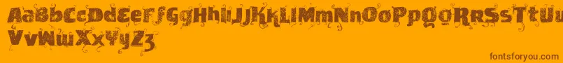 Vtksnewslabel-Schriftart – Braune Schriften auf orangefarbenem Hintergrund