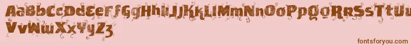 Vtksnewslabel-fontti – ruskeat fontit vaaleanpunaisella taustalla