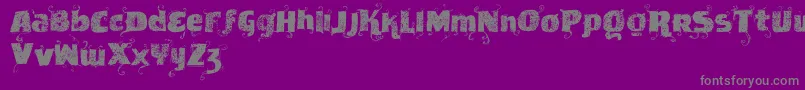 Vtksnewslabel-Schriftart – Graue Schriften auf violettem Hintergrund