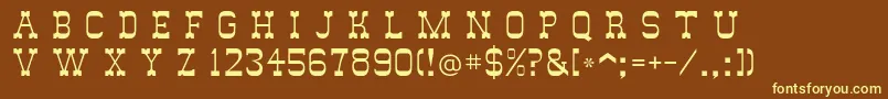 Italianskyb-fontti – keltaiset fontit ruskealla taustalla