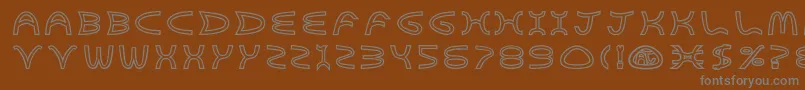 Goldenarches Font – Gray Fonts on Brown Background