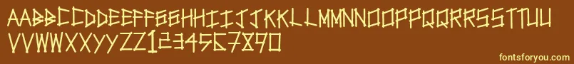 Tapetype Font – Yellow Fonts on Brown Background