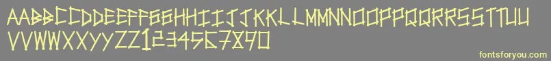 Tapetype Font – Yellow Fonts on Gray Background
