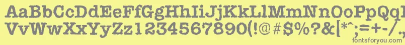 Czcionka TypewriterrandomBold – szare czcionki na żółtym tle