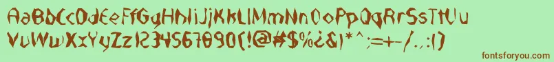 NabateaDefharo Font – Brown Fonts on Green Background