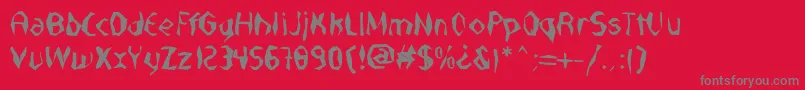 NabateaDefharo-fontti – harmaat kirjasimet punaisella taustalla