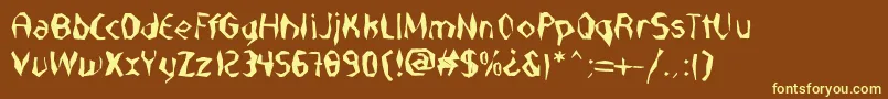 NabateaDefharo-fontti – keltaiset fontit ruskealla taustalla