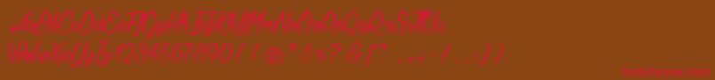 フォントAgathaNeedsFlesh – 赤い文字が茶色の背景にあります。