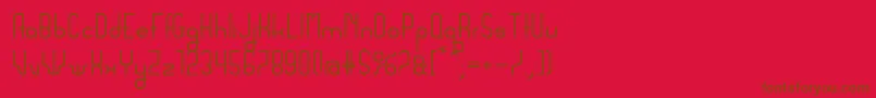 Sanserifing-fontti – ruskeat fontit punaisella taustalla