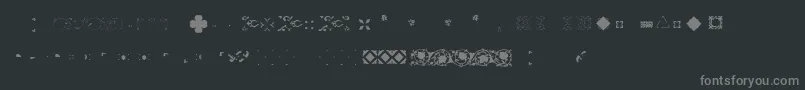 Шрифт Pfornmtreasures2Layer4 – серые шрифты на чёрном фоне