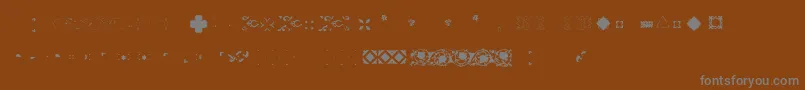 Подробнее о шрифте Pfornmtreasures2Layer4 Шрифт Pfornmtreasures2Layer4 – серые шрифты на коричневом фоне