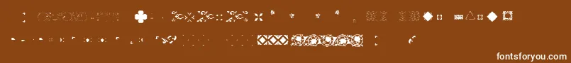 Шрифт Pfornmtreasures2Layer4 – белые шрифты на коричневом фоне