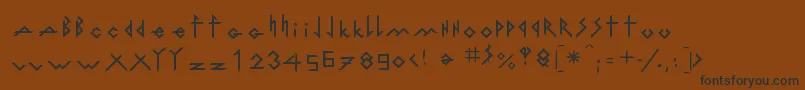 フォントIronhMetallLigth – 黒い文字が茶色の背景にあります