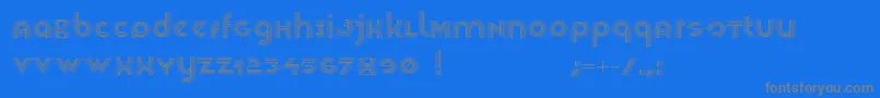 フォントVeselka4f – 青い背景に灰色の文字