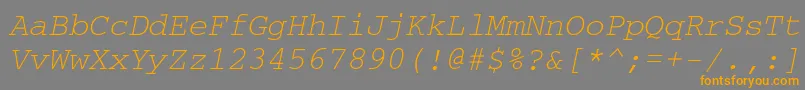 フォントCouriermaccttItalic – オレンジの文字は灰色の背景にあります。