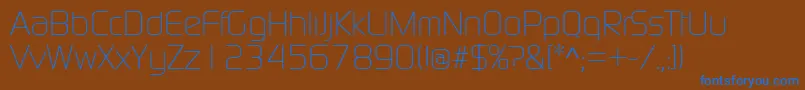 ContinuumLight-Schriftart – Blaue Schriften auf braunem Hintergrund