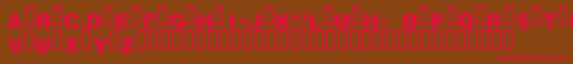 KrNicksPuppy1-Schriftart – Rote Schriften auf braunem Hintergrund