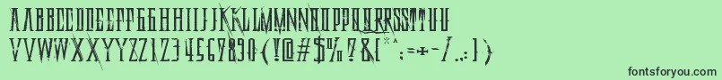 DeadlyBlackChainExtended Font – Black Fonts on Green Background