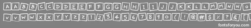 フォントCuteNotes – 灰色の背景に白い文字
