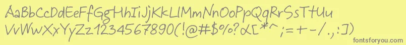 フォントJeffScript – 黄色の背景に灰色の文字