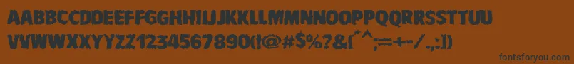 VtcbadnauseaRegular Font – Black Fonts on Brown Background