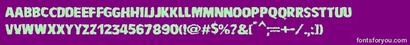 VtcbadnauseaRegular Font – Green Fonts on Purple Background