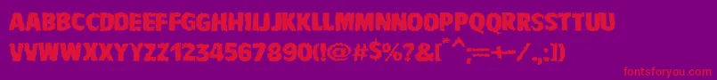 VtcbadnauseaRegular Font – Red Fonts on Purple Background