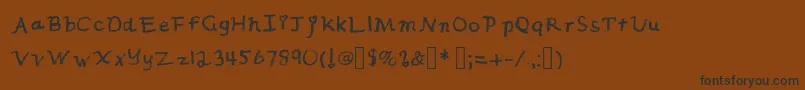 フォントIcing1 – 黒い文字が茶色の背景にあります