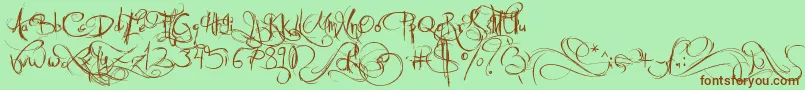 Шрифт JellykaCastleSQueen – коричневые шрифты на зелёном фоне