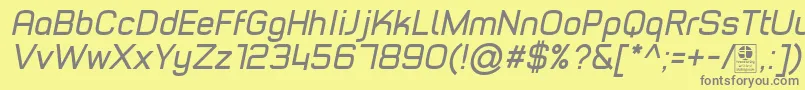 TypoStyleItalicDemo-Schriftart – Graue Schriften auf gelbem Hintergrund