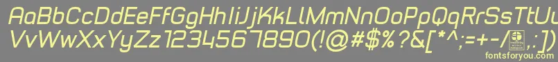 TypoStyleItalicDemo-Schriftart – Gelbe Schriften auf grauem Hintergrund