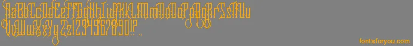 RoyaltySavior Font – Orange Fonts on Gray Background