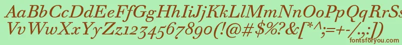 Fonte WalbaumTextProItalic – fontes marrons em um fundo verde