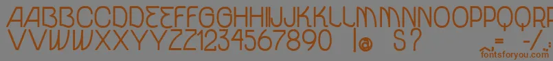 VtksUnidadeBold Font – Brown Fonts on Gray Background