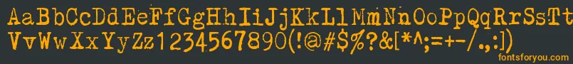 Kirjainkone Font – Orange Fonts on Black Background