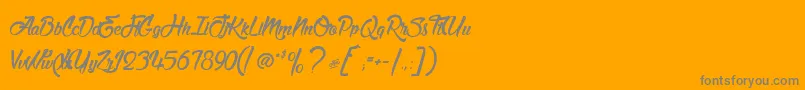 MatadorDeNimes-Schriftart – Graue Schriften auf orangefarbenem Hintergrund