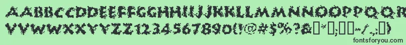 Huckb-Schriftart – Schwarze Schriften auf grünem Hintergrund