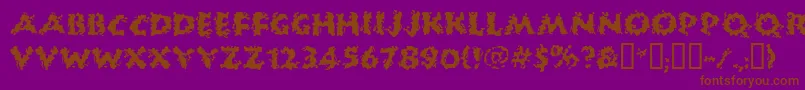 フォントHuckb – 紫色の背景に茶色のフォント