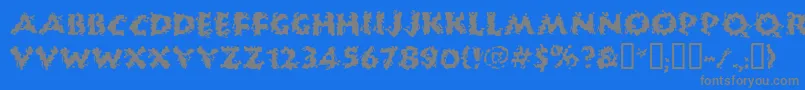 Huckb-fontti – harmaat kirjasimet sinisellä taustalla