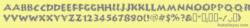 Huckb-Schriftart – Graue Schriften auf gelbem Hintergrund