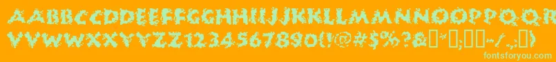 Huckb-Schriftart – Grüne Schriften auf orangefarbenem Hintergrund