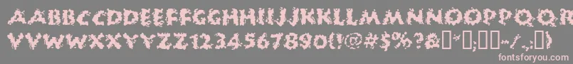 Huckb-Schriftart – Rosa Schriften auf grauem Hintergrund