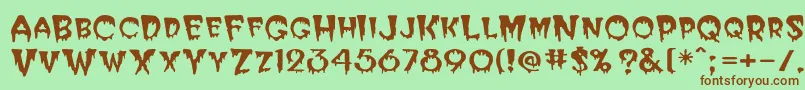 Postcryp Font – Brown Fonts on Green Background