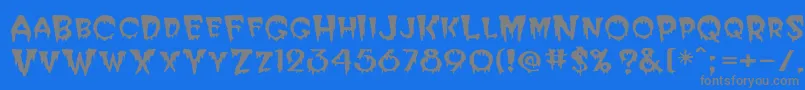 フォントPostcryp – 青い背景に灰色の文字