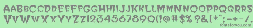 フォントPostcryp – 緑の背景に灰色の文字