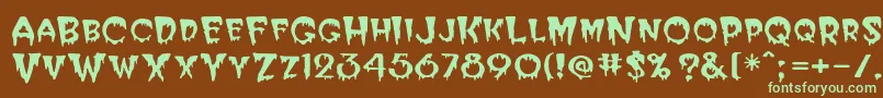 Postcryp Font – Green Fonts on Brown Background