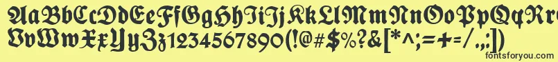 PlakatFrakturunz1l-fontti – mustat fontit keltaisella taustalla