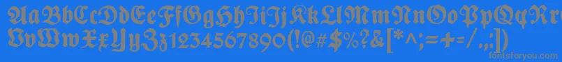 PlakatFrakturunz1l-fontti – harmaat kirjasimet sinisellä taustalla
